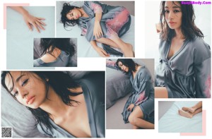 A woman laying on top of a bed next to a pillow.