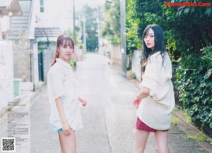 A magazine page with a picture of two young women.
